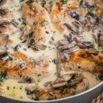 creamy herb mushroom chicken in the frying pan