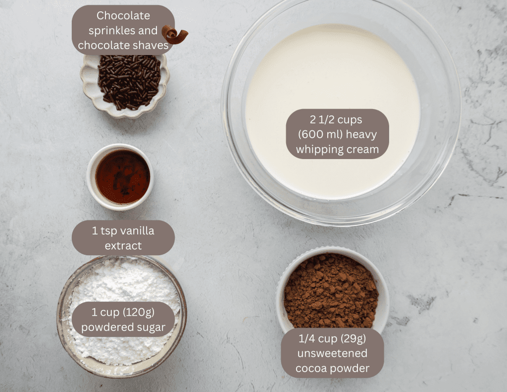 Ingredients for whipped cream topping- whipping cream, vanilla chocolate, powdered sugar, cocoa powder