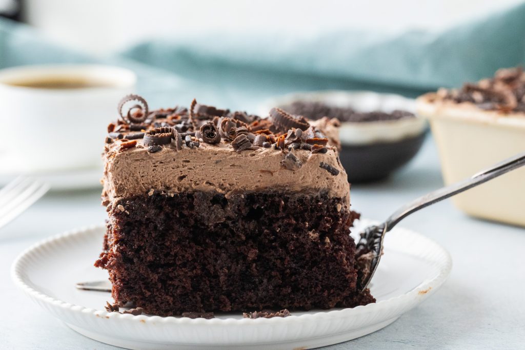 chocolate poke cake on the serving spatula