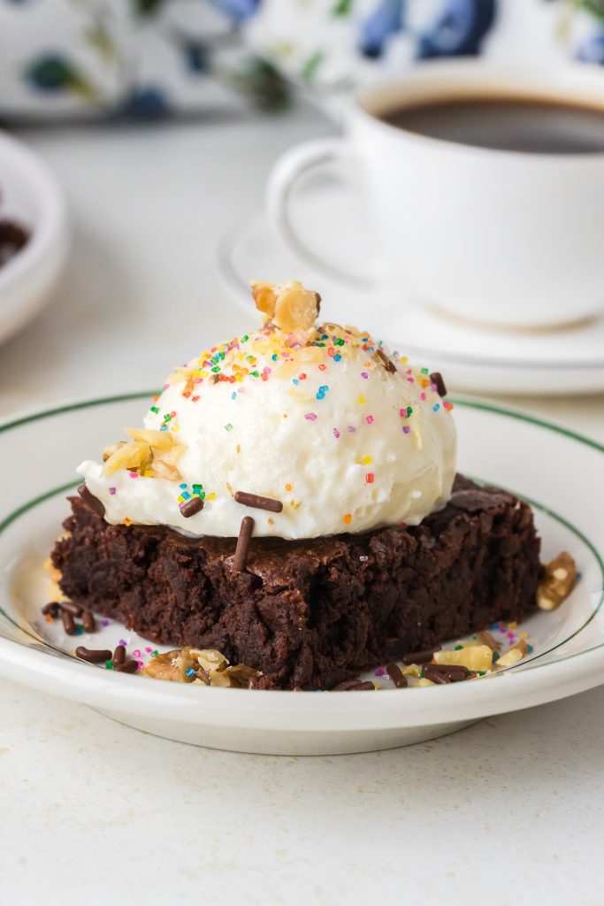 Brownie with ice cream, nuts and sprinkles