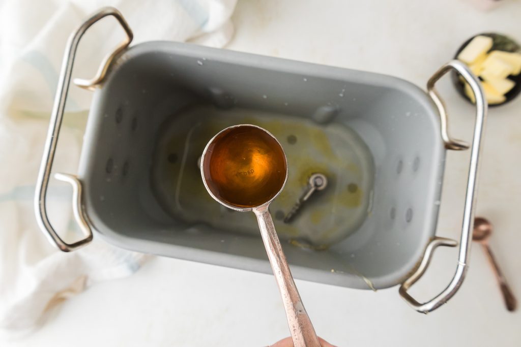 Adding honey to water