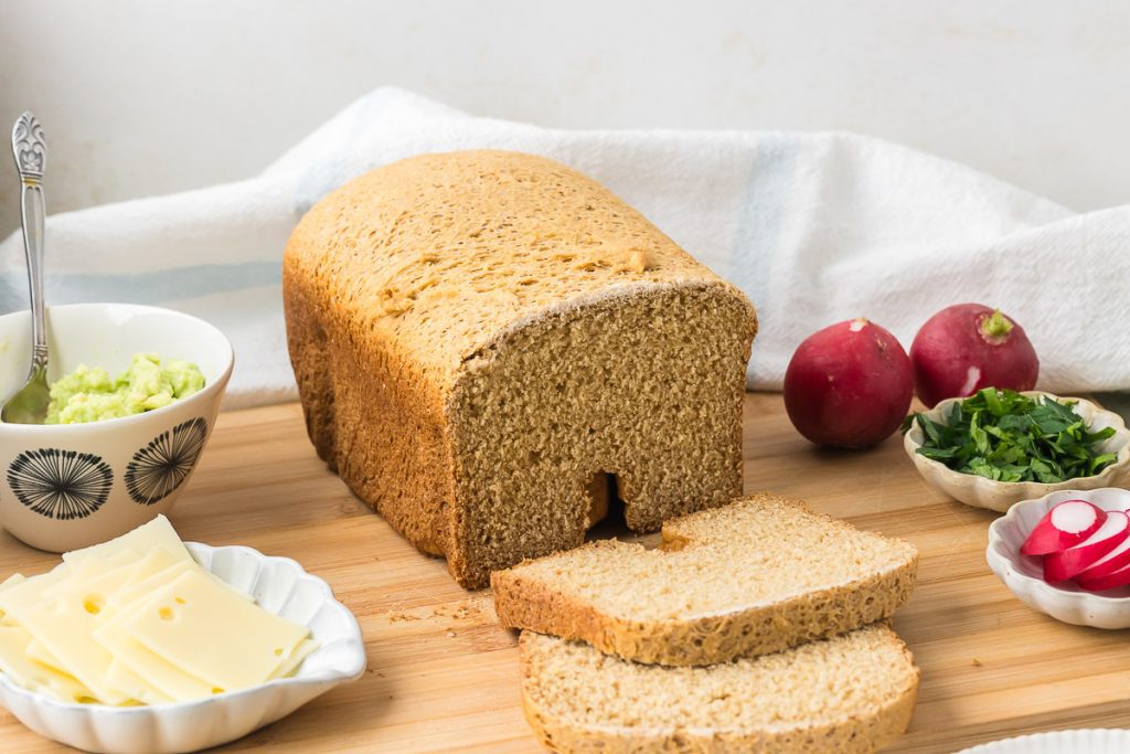 Bread with vegetables on the cutting board