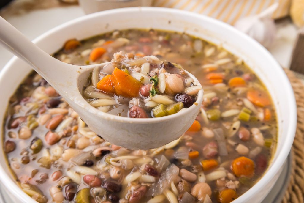 Mixed bean soup being served