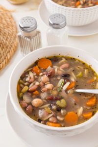 Hearty mixed bean soup in a bowl, budget-friendly one-pot meal