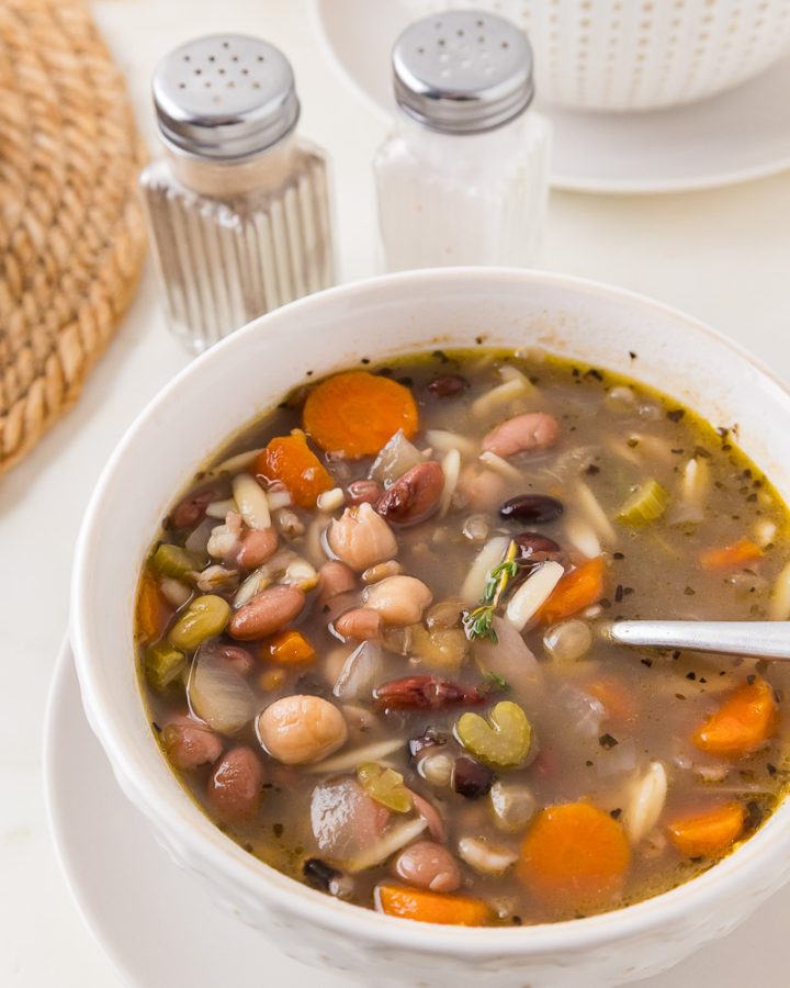 Hearty mixed bean soup in a bowl, budget-friendly one-pot meal