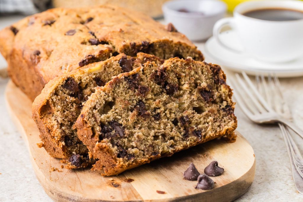 Banana bread with freshly milled flour on the cutting board.