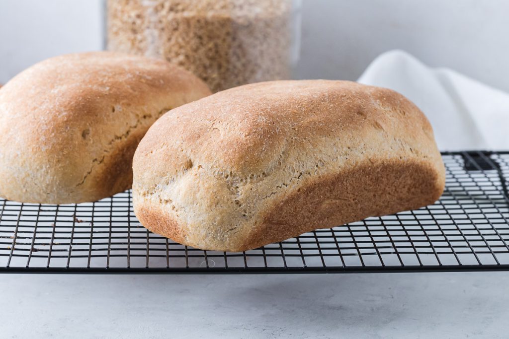 2 loaves of yeast bread on the cooling rack. 