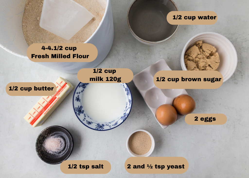 ingredients for cinnamon roll - freshly milled flour, milk, water, brown sugar, eggs, milk, cup butter salt, yeast