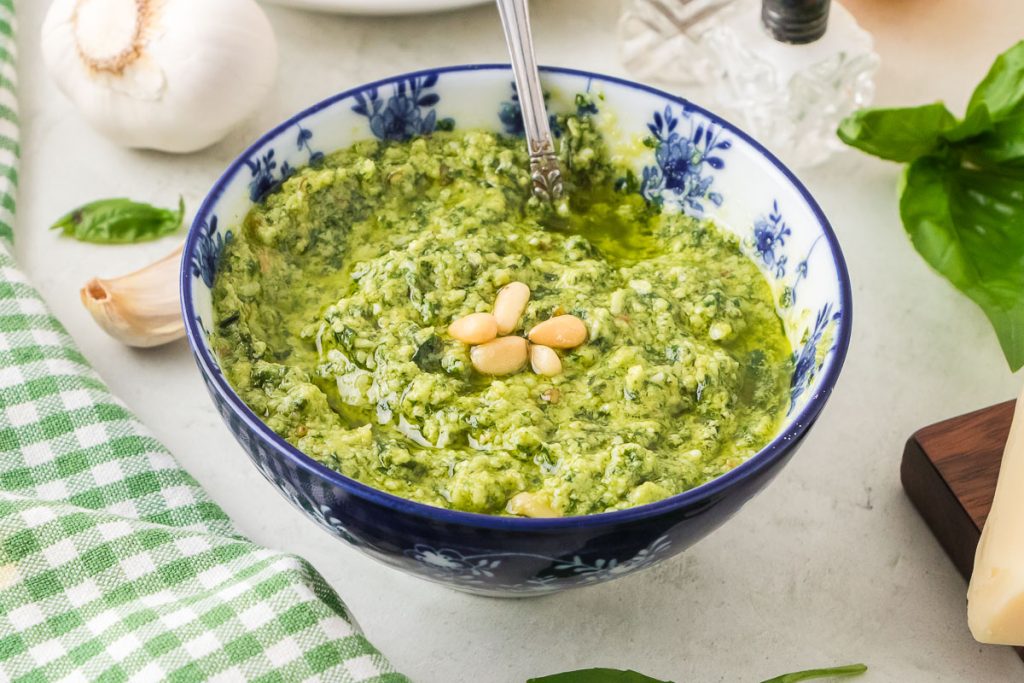 Pesto in the bowl with pine nuts