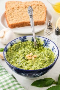 Homemade basil pesto made with fresh basil, pine nuts, Parmesan, and olive oil