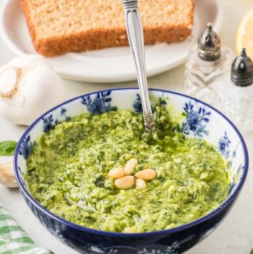 Homemade basil pesto made with fresh basil, pine nuts, Parmesan, and olive oil